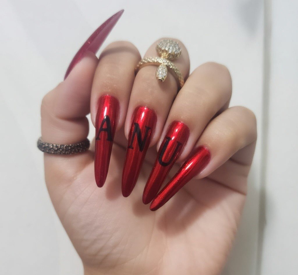 Chennai dominatrix Mistress Anu displaying long natural nails on hands highlighting nail worship and control