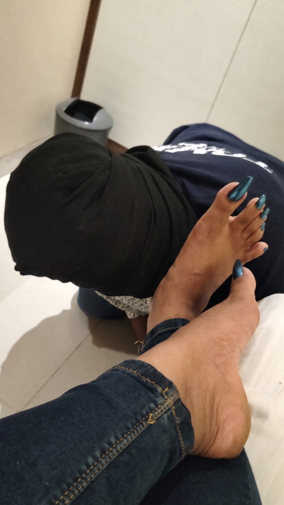 Mistress Anu Malkin Bangkok BDSM Mistress demonstrating female domination and foot worship authority during a private BDSM session