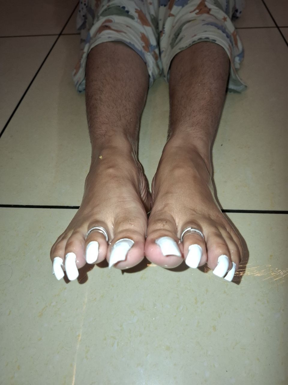 Aalborg BDSM Mistress Anu feet with long painted toenails
