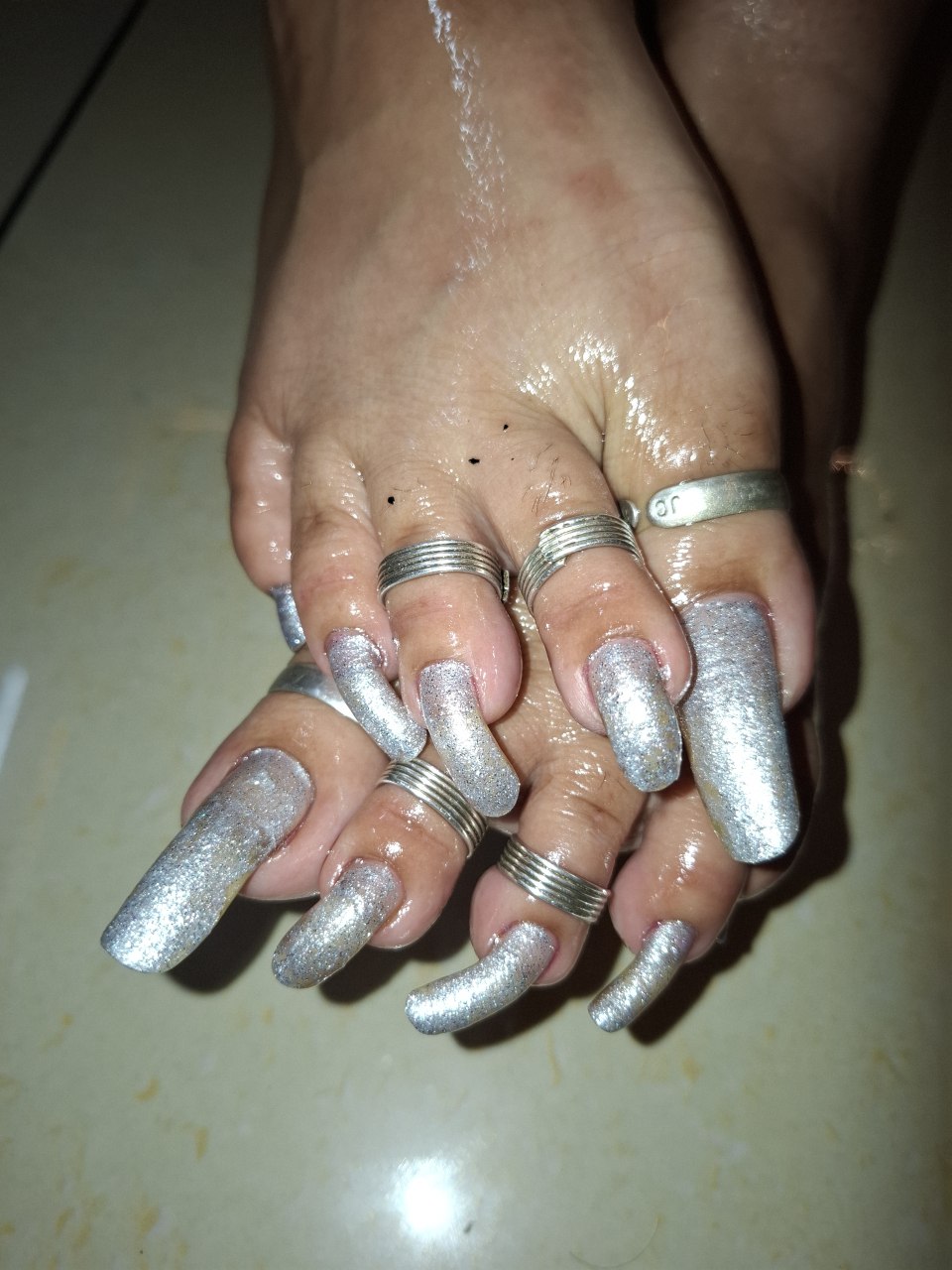 Calgary BDSM Mistress Anu unique long nails photo