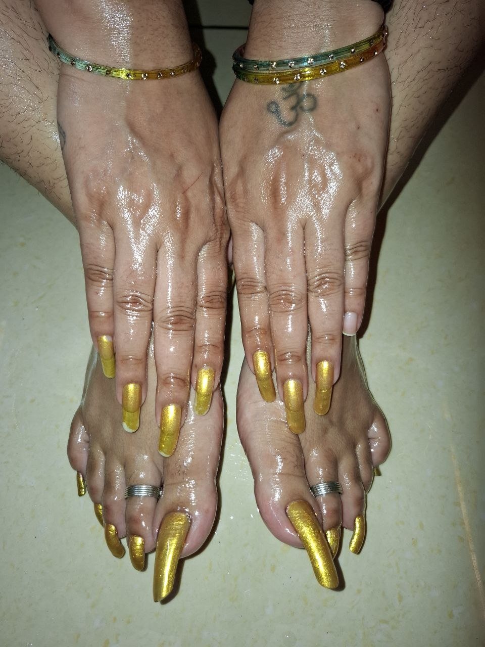 Rishikesh BDSM Mistress Anu feet with long painted toenails