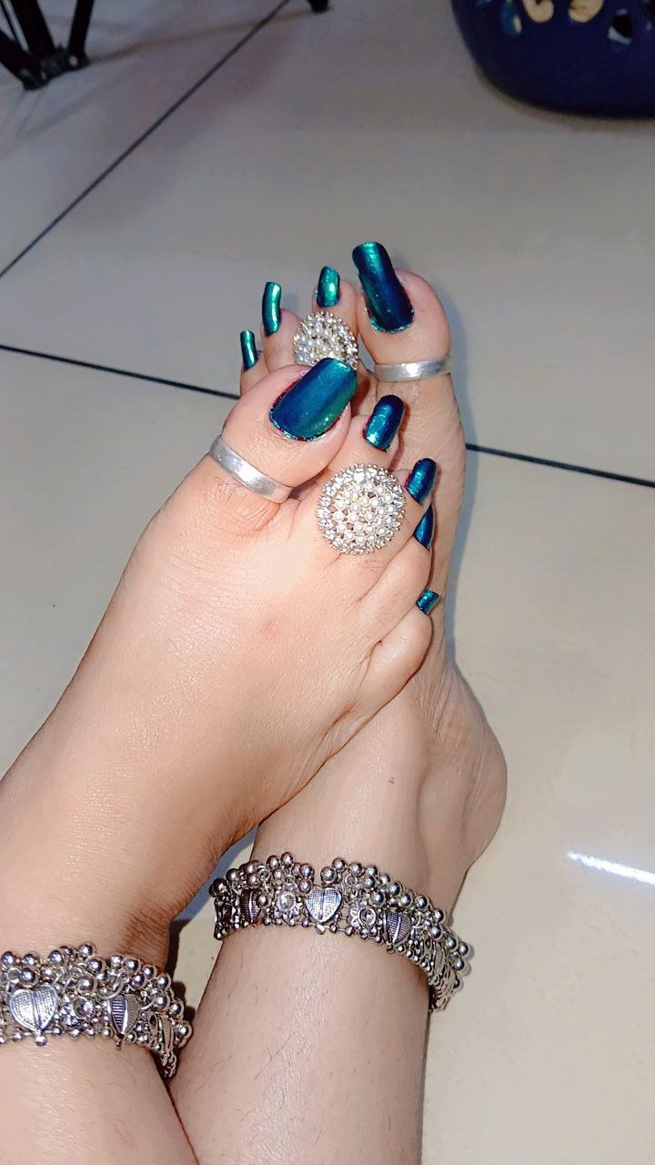 Blue Painted Toenails for the Seville (Sevilla) BDSM Mistress Anu page